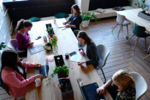 women working in a coworking space office
