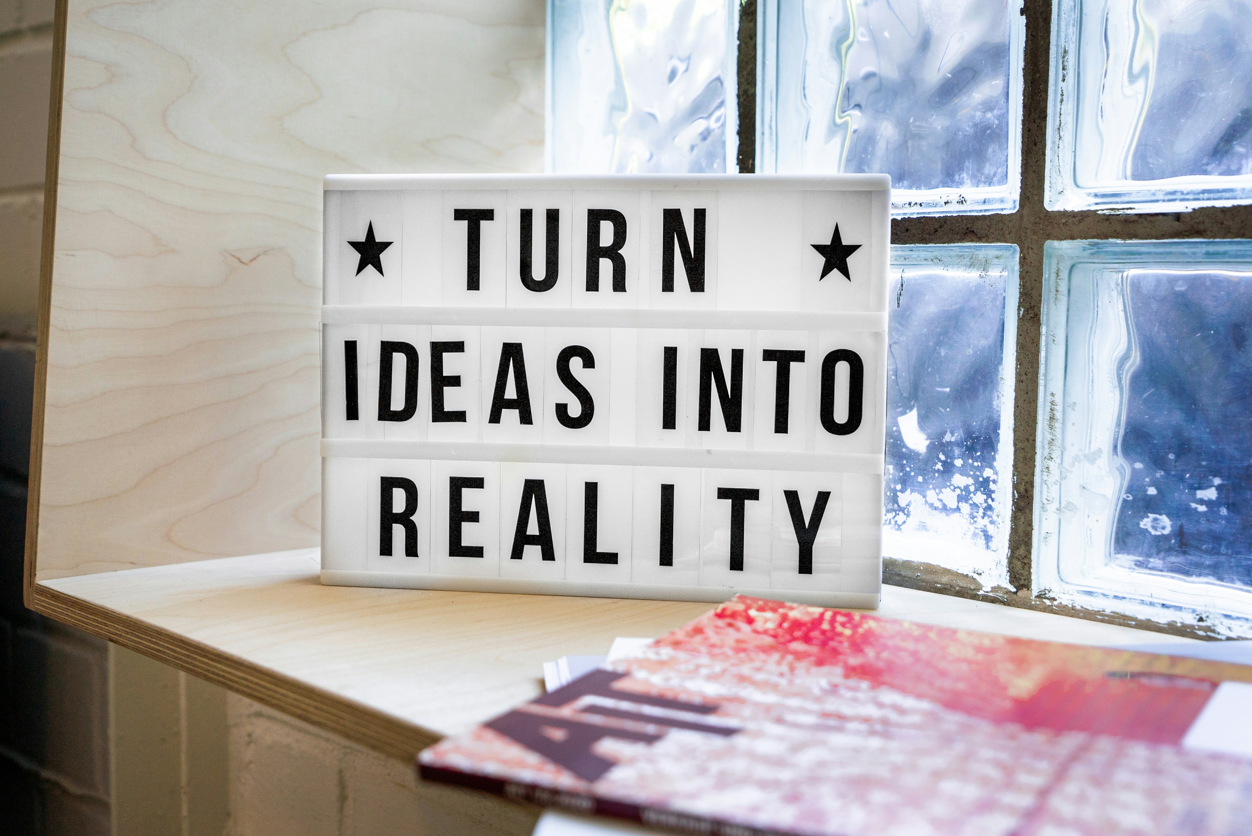 desk sign: turn ideas into reality