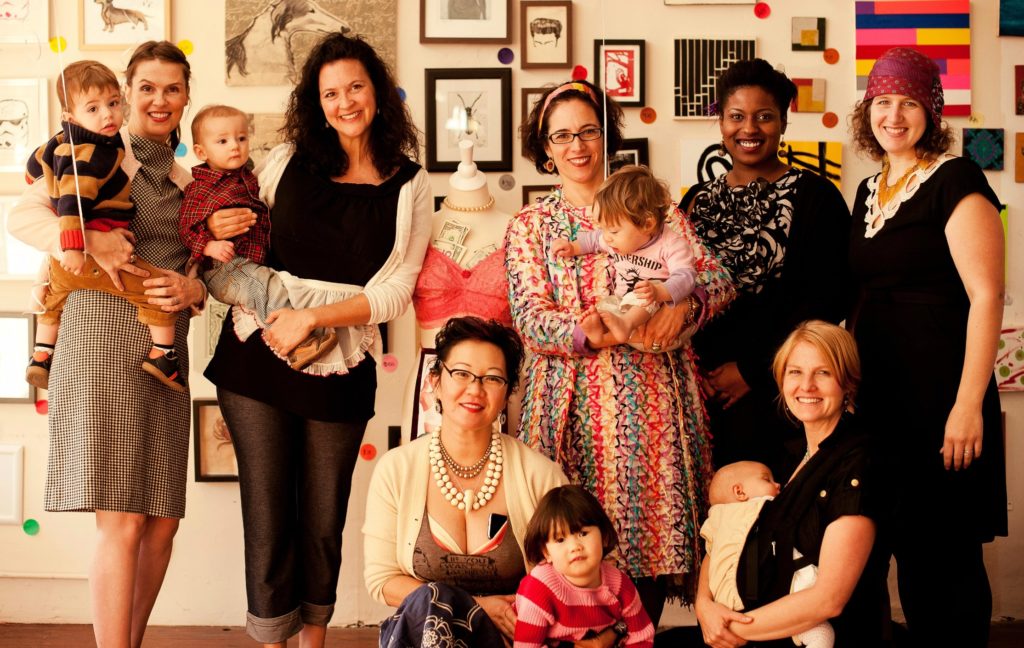a group photo of women with children