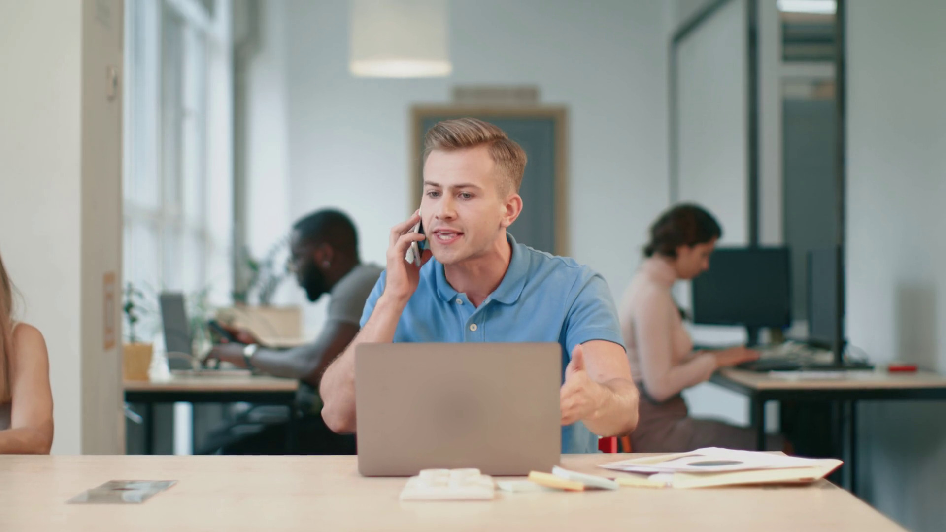 man angry and shouting while working from a coworking office