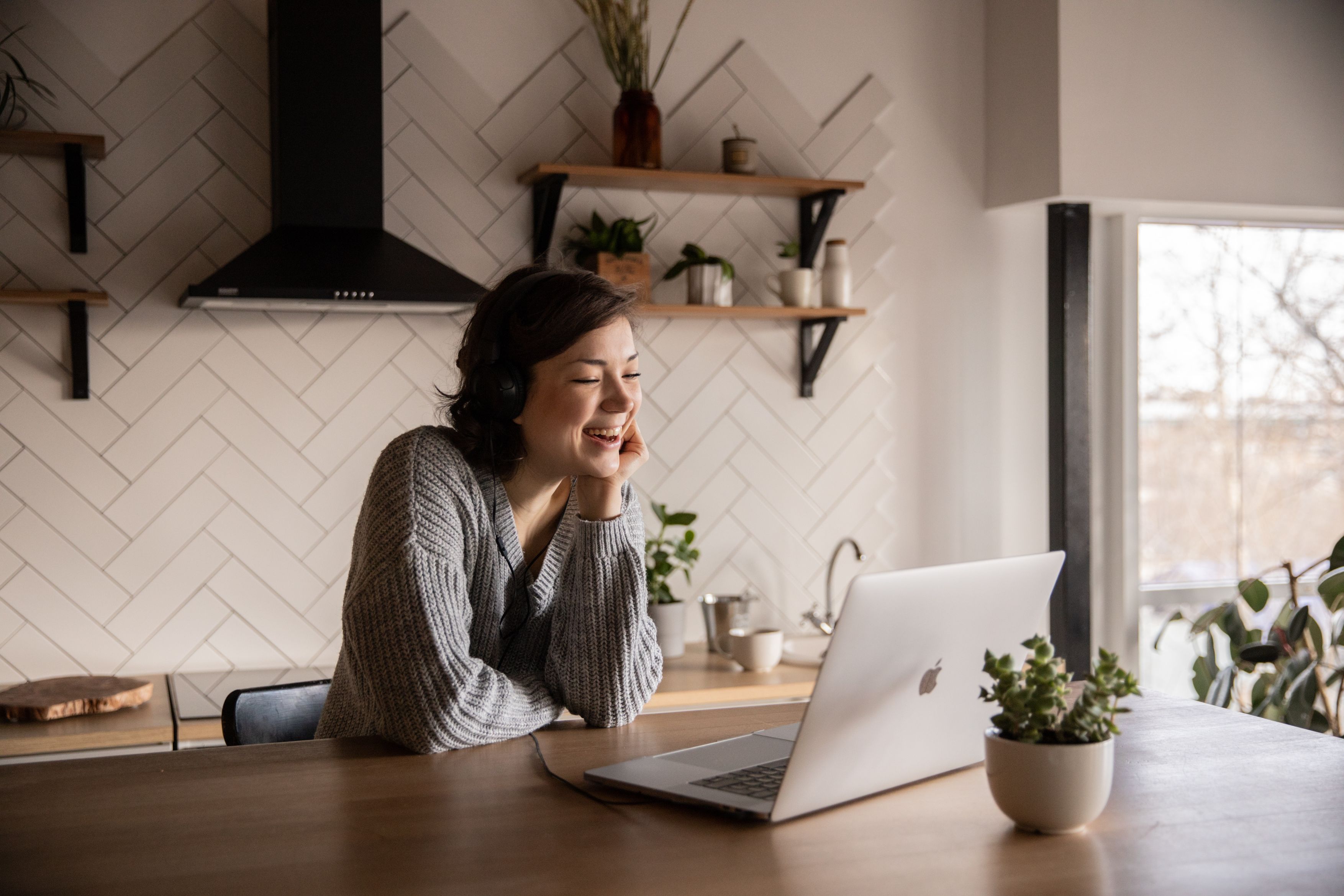 woman having a meeting on laptop