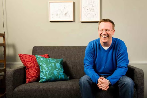 man sitting on a couch