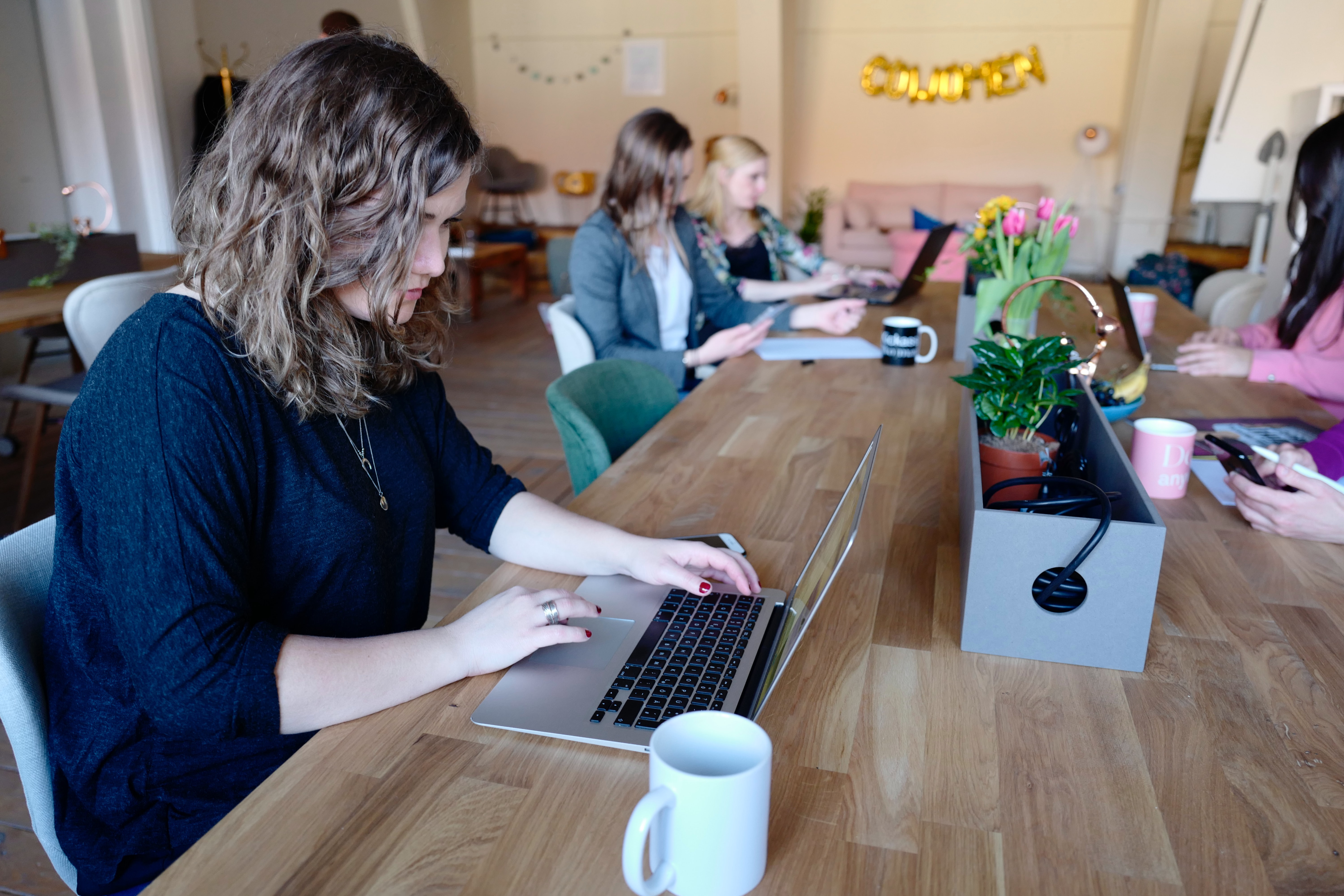women working from a coworking space