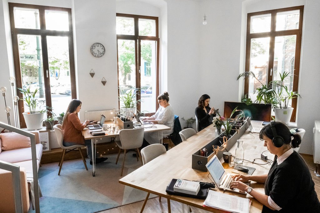 women working from a coworking office