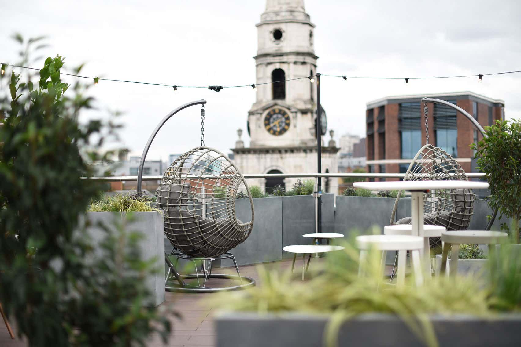 a balcony in a coworking building