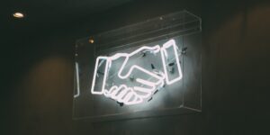 handshake emoji neon lights sign