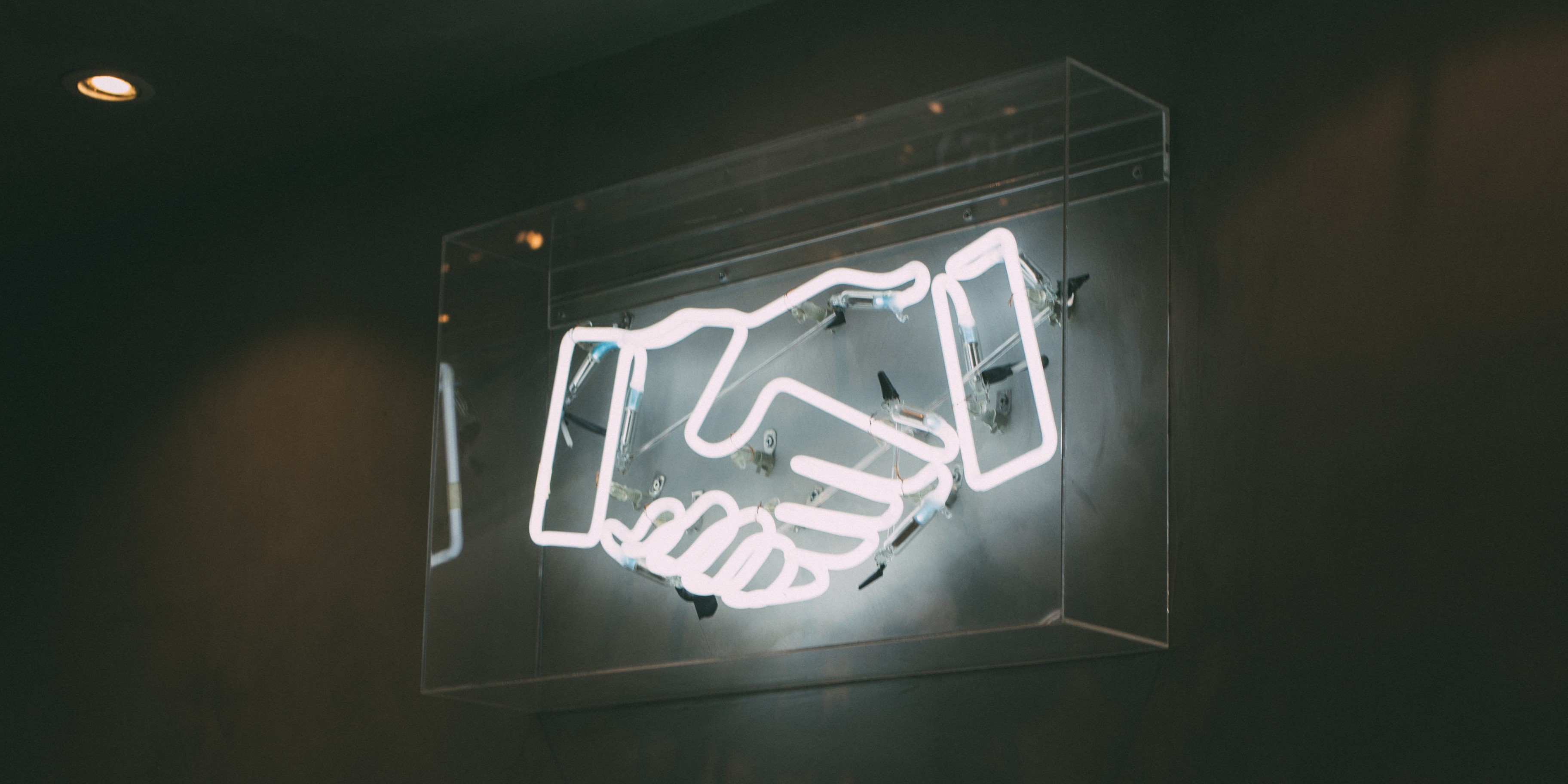 handshake emoji neon lights sign