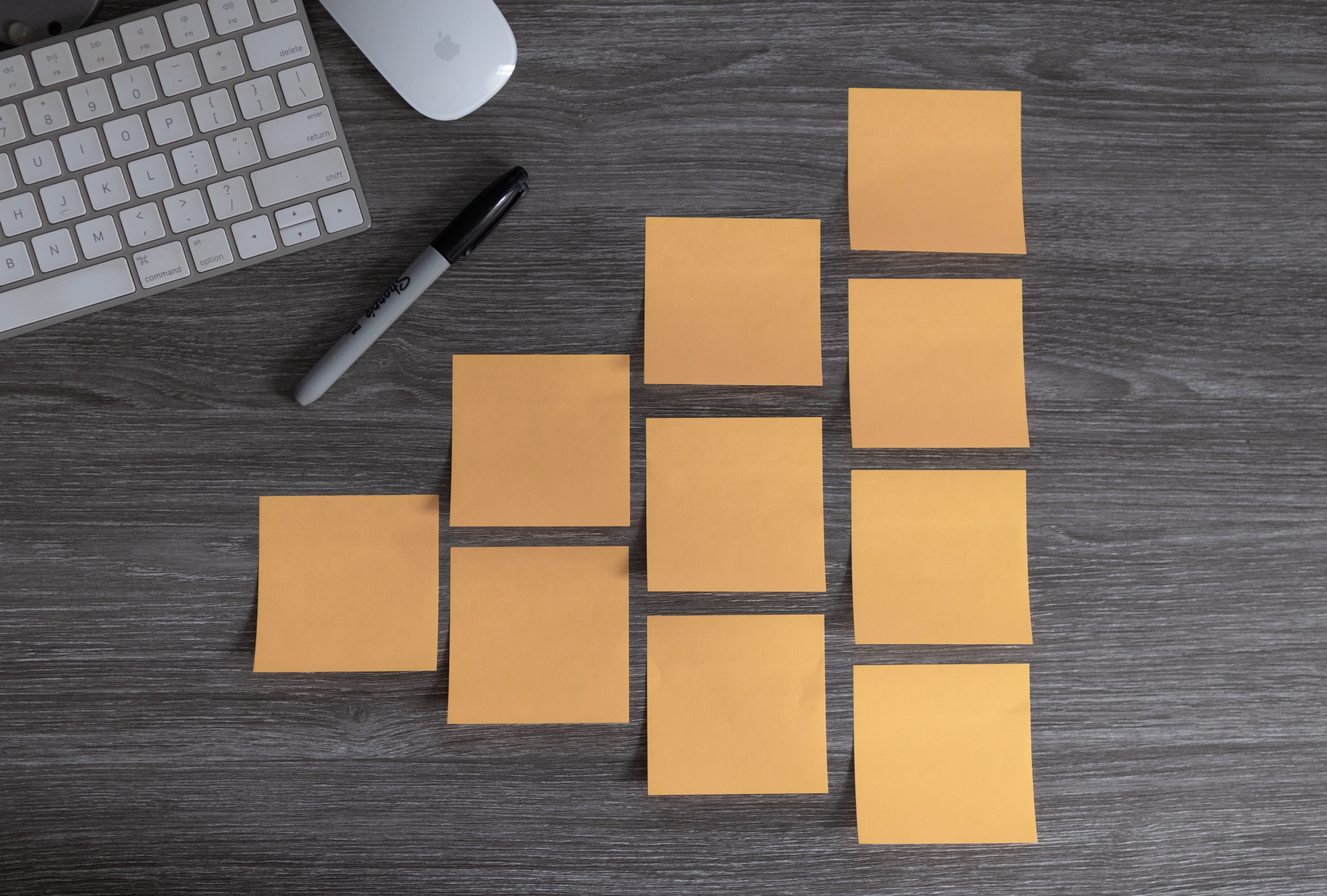 orange post it notes on the table