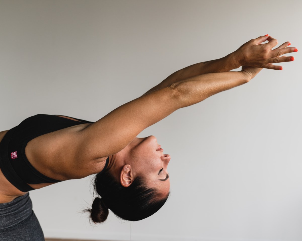 woman practicing yoga