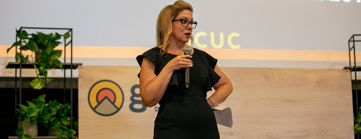 Liz Elam holding a speech at gcuc