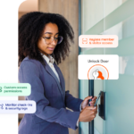 woman opening an office door with smart access controls