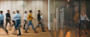 People walking in an office corridor