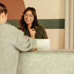 Serving a member from a reception desk
