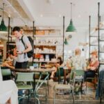 Lots of people in a busy coworking office canteen